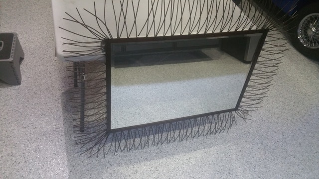 Wall mirror with beveled glass and metal frame - photo 2