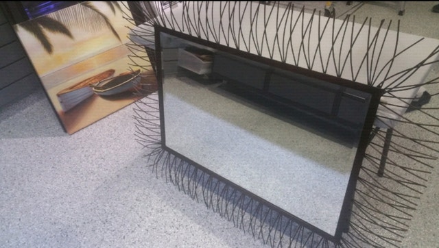 Wall mirror with beveled glass and metal frame - photo 5