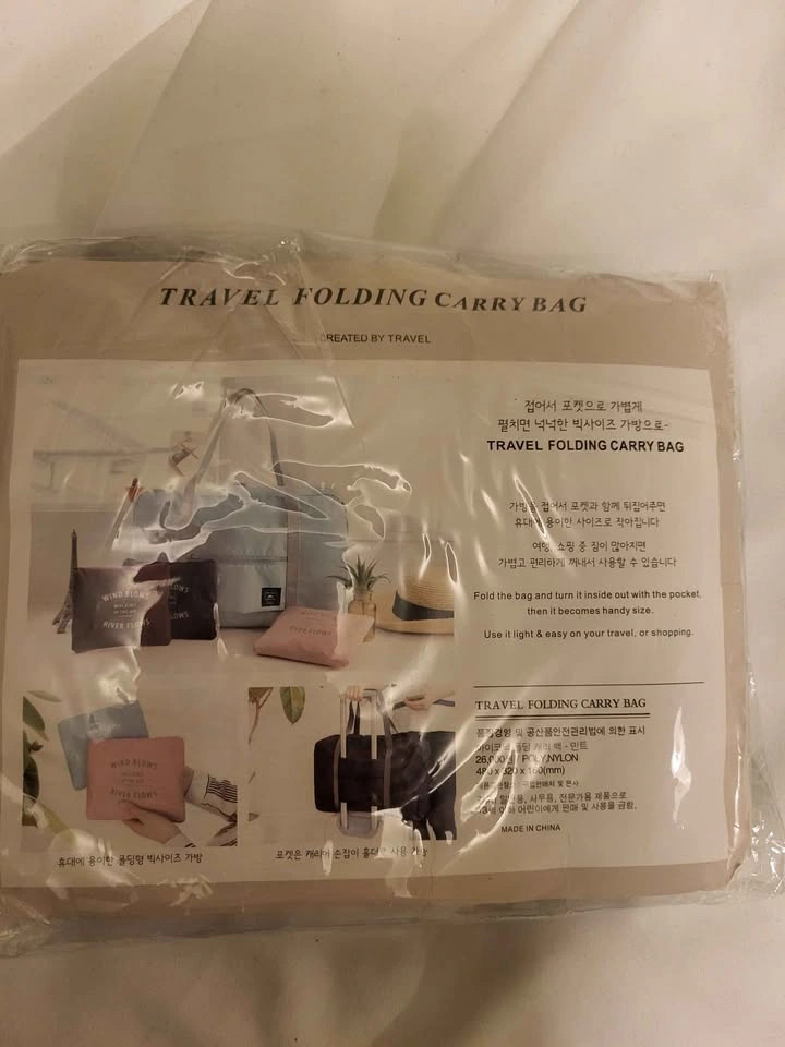 Travel bag. Attaches to handle of suitcase. Folds into a small s - photo 2