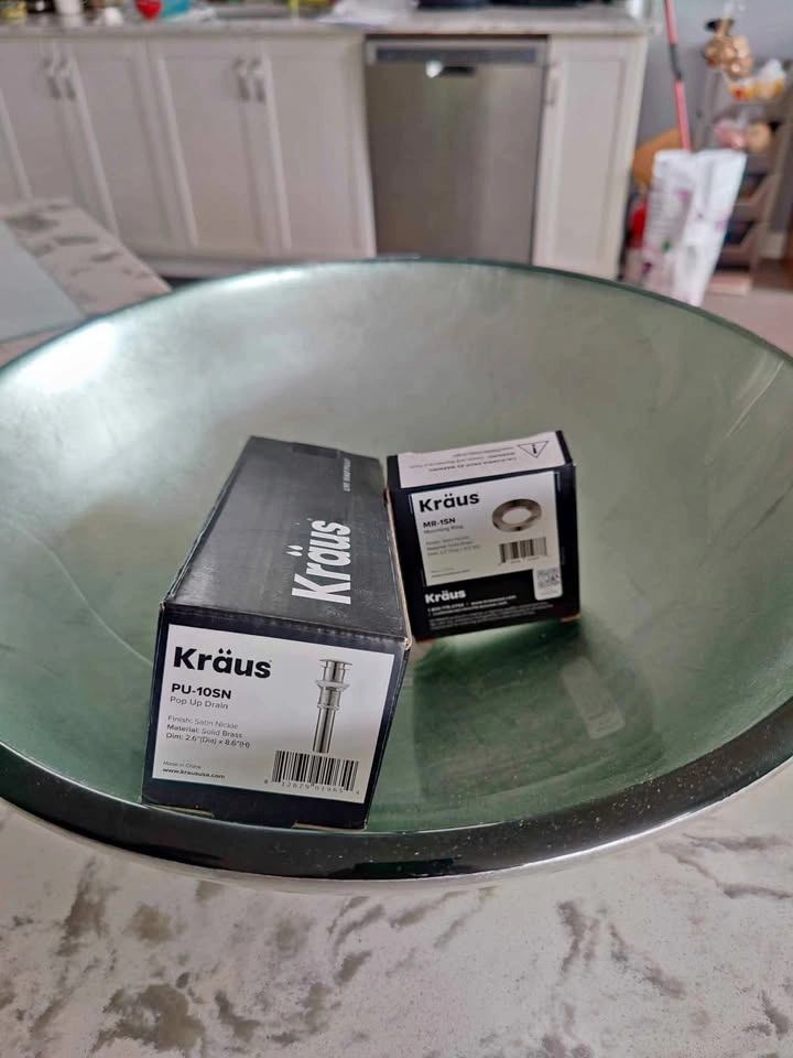 Glass sink with drain