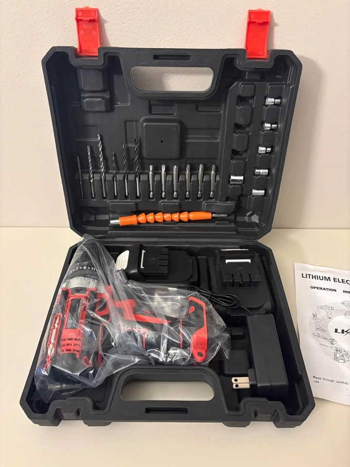 Electric cordless portable drill set with 2 batteries, bits and - photo 2