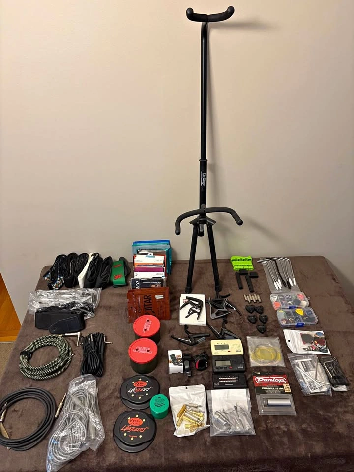 Acoustic electric Guitar capo case strap stand cable and more