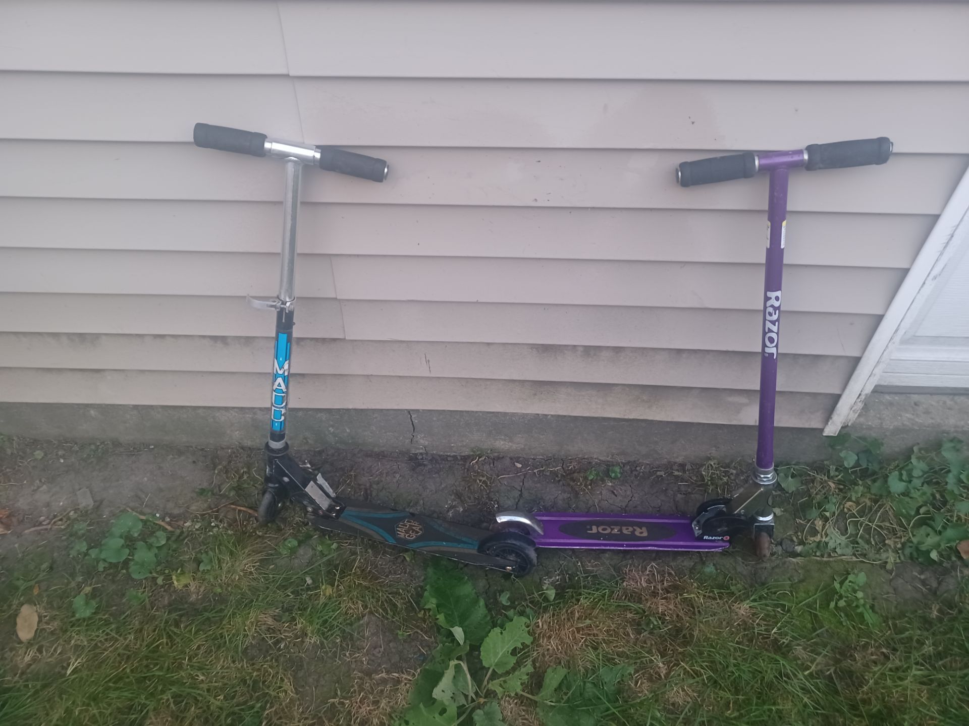 2 kids push scooters solid condition