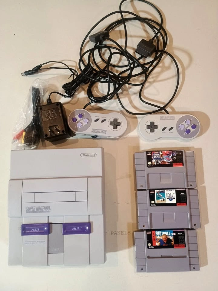 Super Nintendo SNES Bundle – 2 Controllers + 4 Games