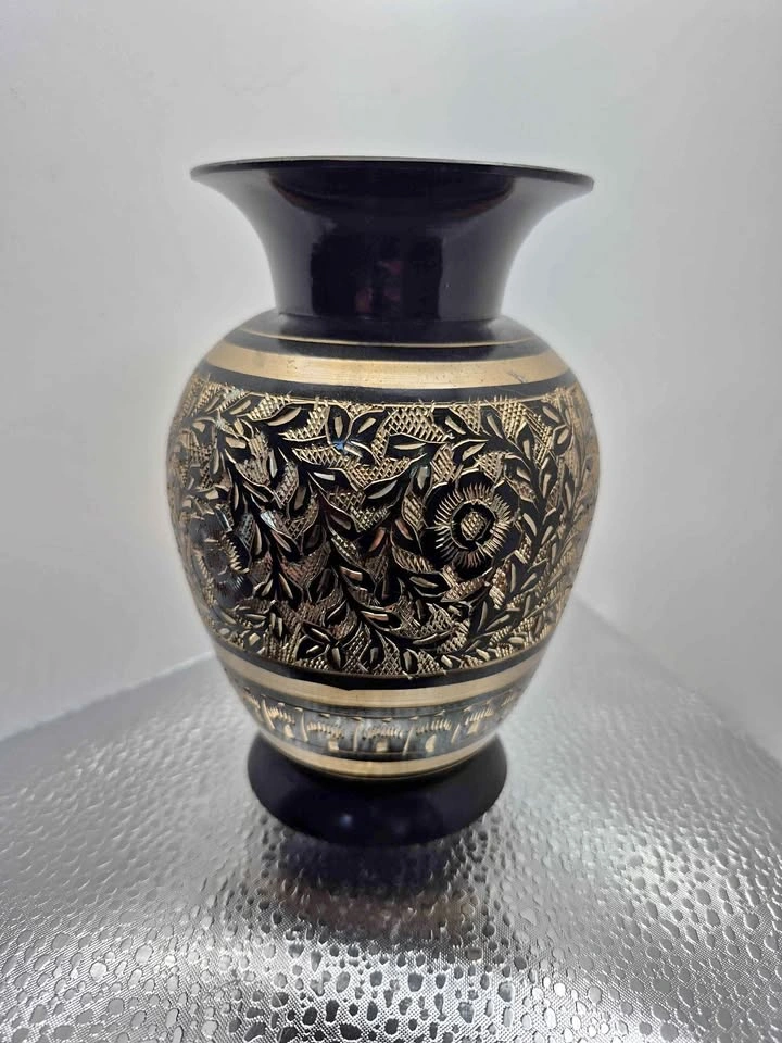 Intricate gold and black floral patterned vase (Skokie)