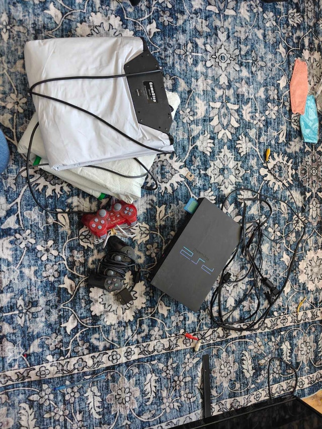 PS2 w/ two controllers and two dance pads