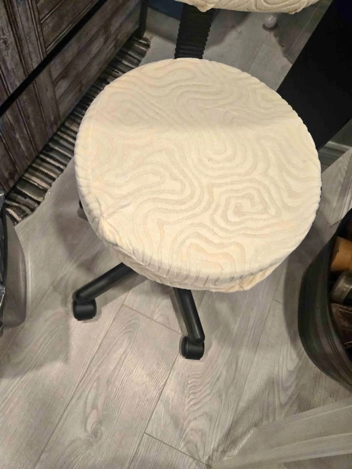 Adjustable thick cushiony desk chair with cover available
