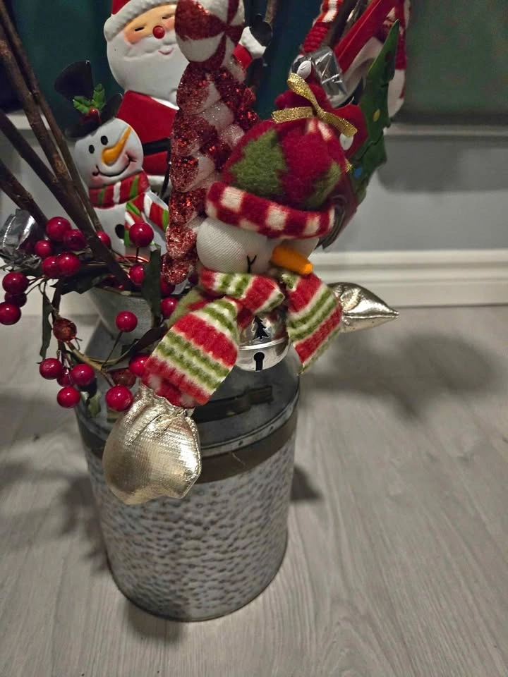 $20 Galvanized jug with Christmas decor sticks