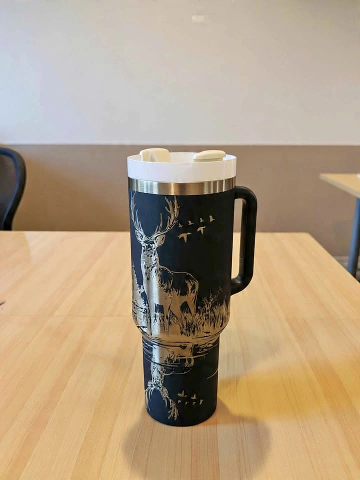 Blue travel mug with handle, deer design