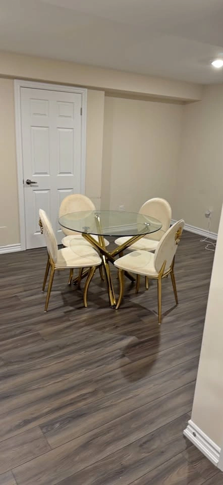 Glass Dining Table with 4 Cream and Gold Chairs