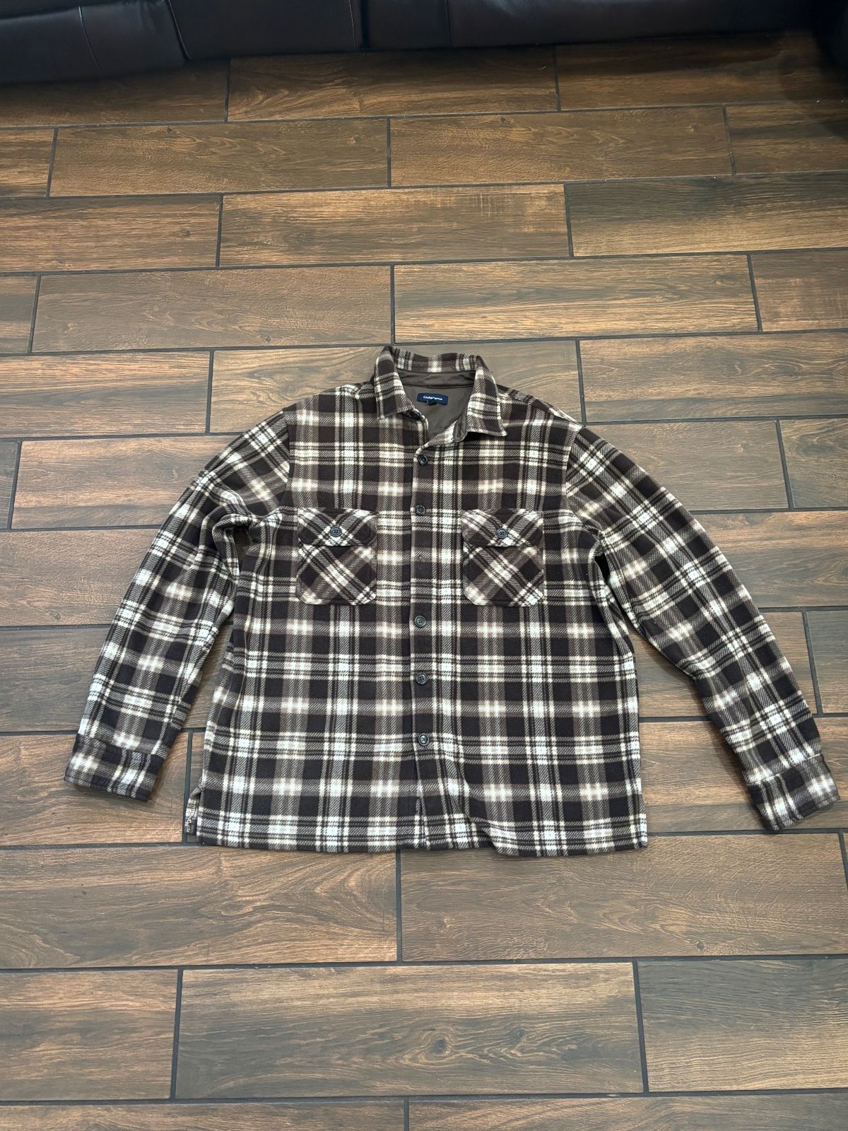 brown and black plaid button-up flannel shirt-jacket