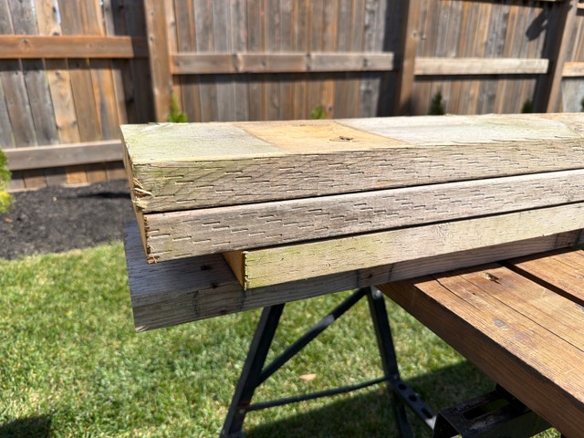 Pressure treated wood posts and lumber - photo 2