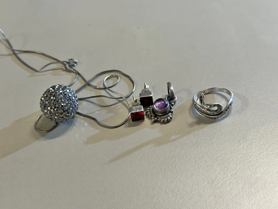 Sterling silver jewelry lot: Swarovski pendant, ring, pendant
