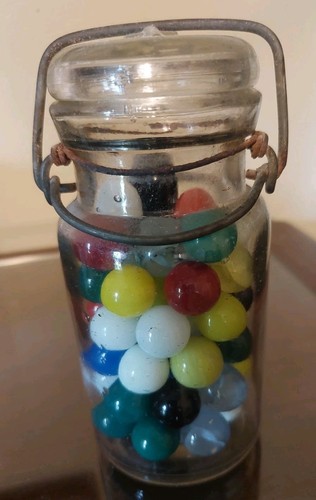 Vintage Marbles In Old glass Jar