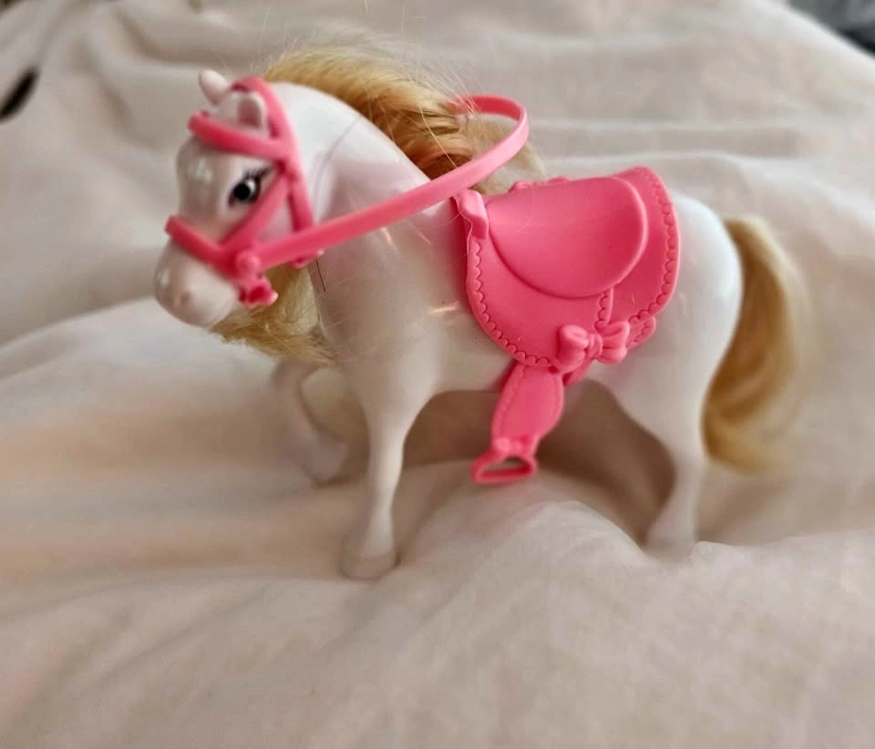 White Toy Horse with Pink Saddle and Bridle