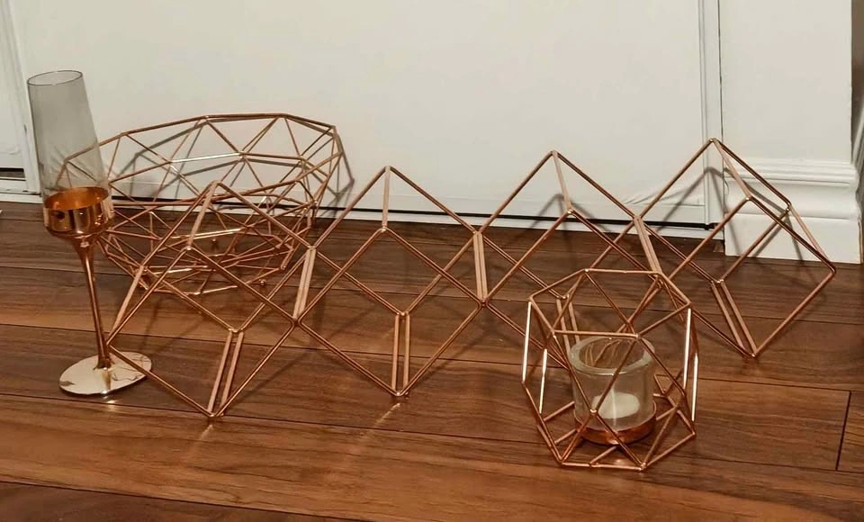 Rose gold bowl, wine rack, candle holder and champagne flute