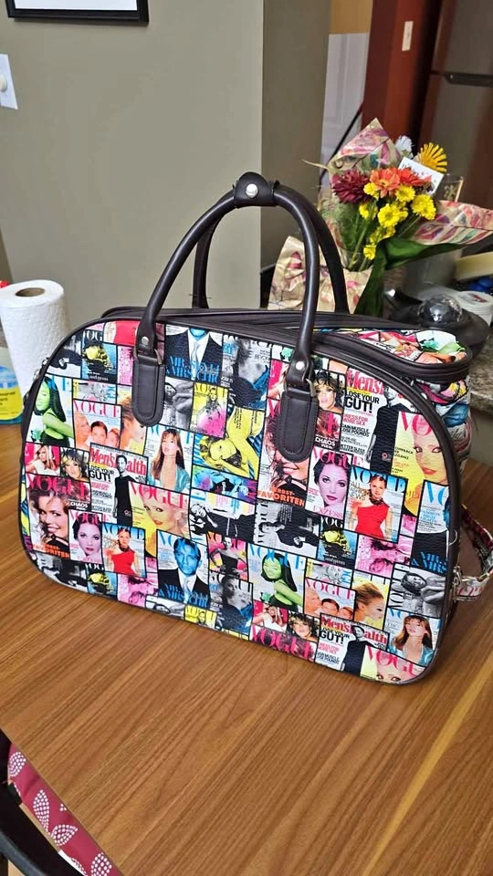 Magazine Print Rolling Duffel Bag
