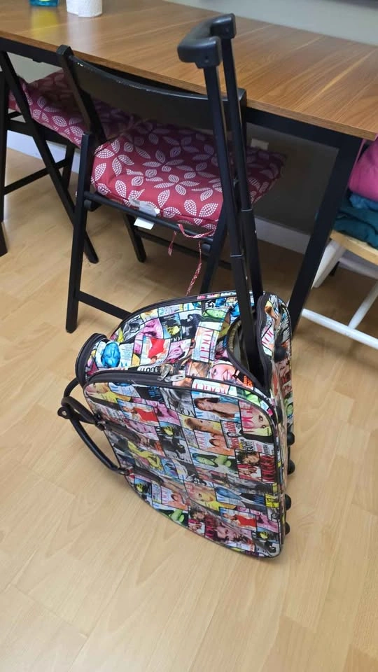 Magazine Print Rolling Duffel Bag - photo 4