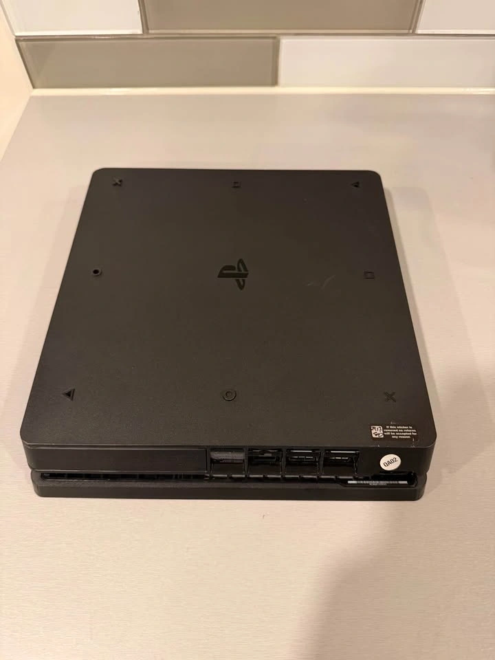 PlayStation 4 Slim with Controller 500GB - photo 3