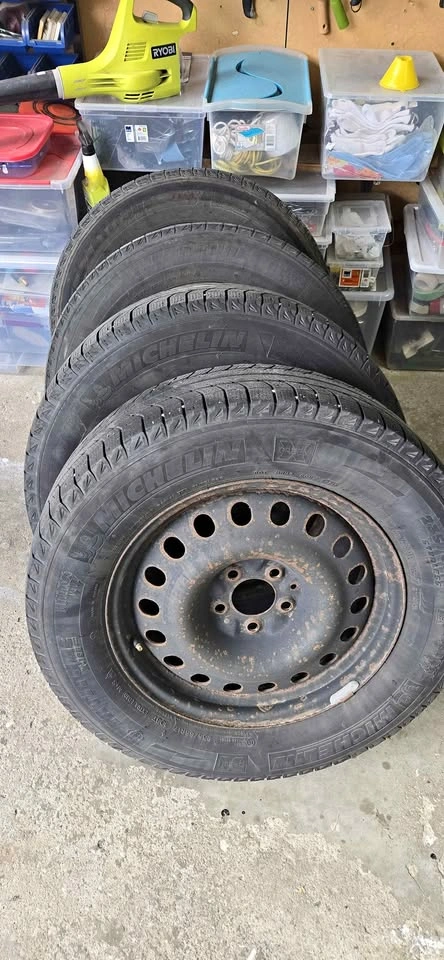 3 Michelin Latitude X-Ice 235/65R17 Winter Tires with 4 Rims