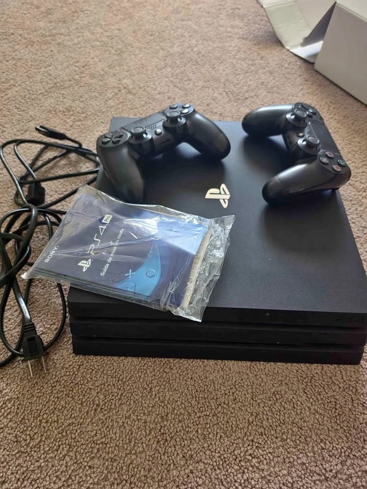 PlayStation 4 Pro 1TB Bundle with 2 Controllers and 6 Games
