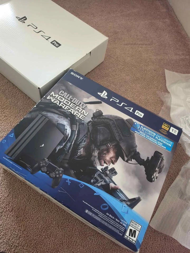 PlayStation 4 Pro 1TB Bundle with 2 Controllers and 6 Games - photo 3