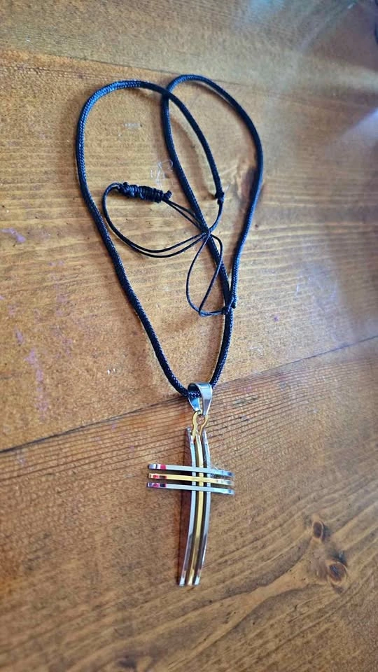 Multi-Tone Layered Cross Pendant Necklace on black cord
