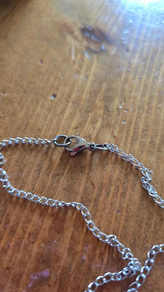 Silver-Toned Interlocking Heart Cross Necklace - photo 3