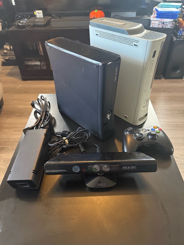 Xbox 360 slim consoles with Kinect and controller