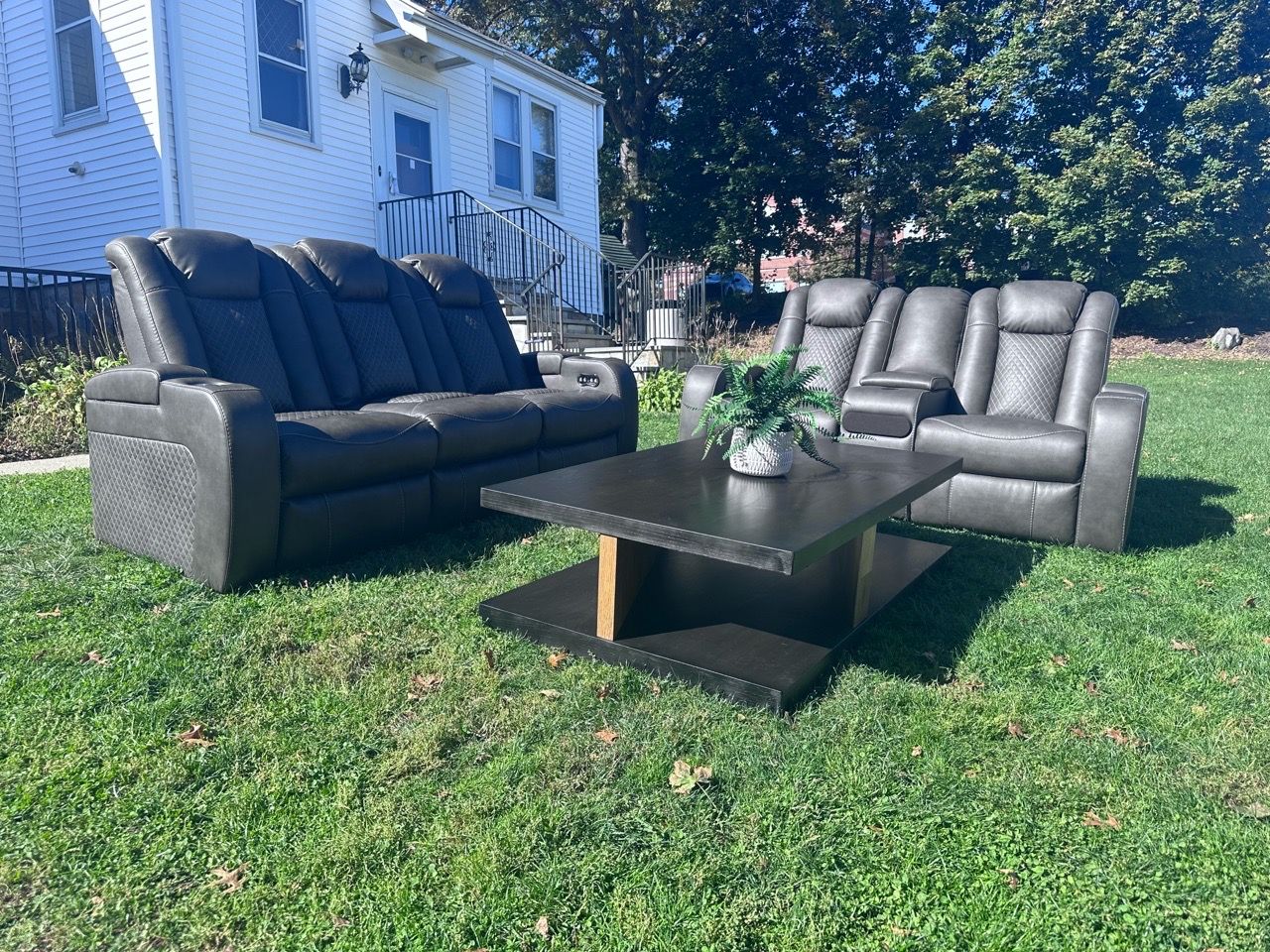 Gray Leather Reclining Sofa and Loveseat Set