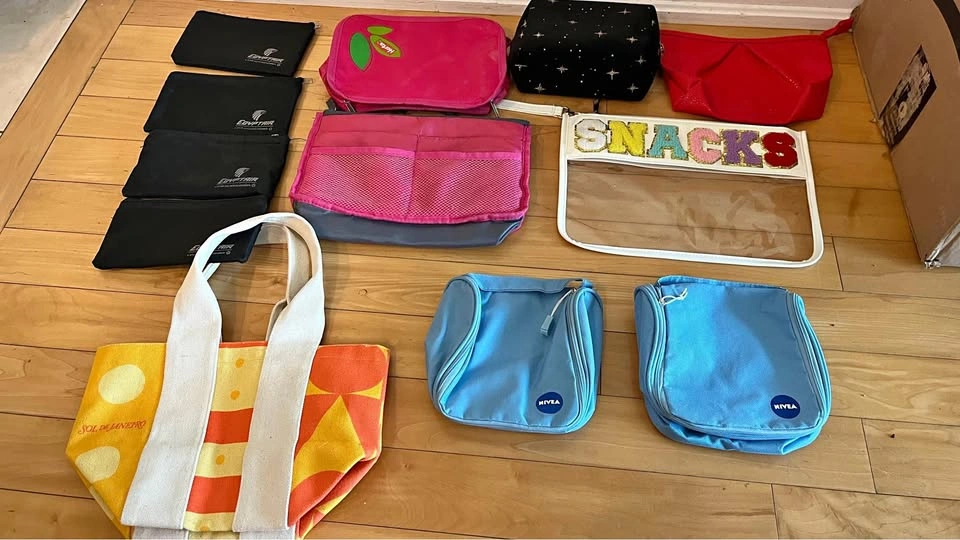 Set of different make up bags including Sol de Janeiro, Sephora,