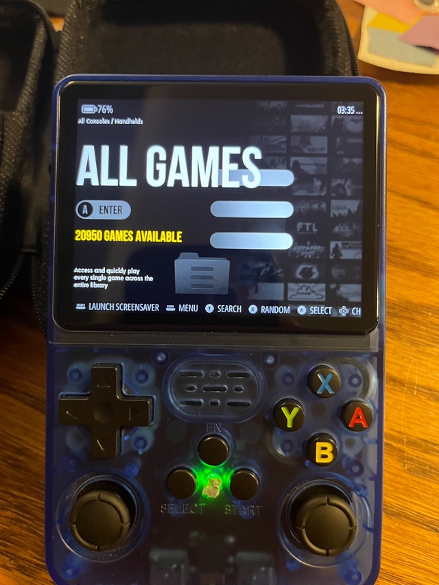 r36s with Samsung SD card and protective case