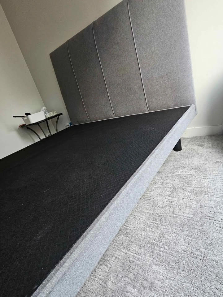 Solid bed frame with grey upholstered headboard - photo 5