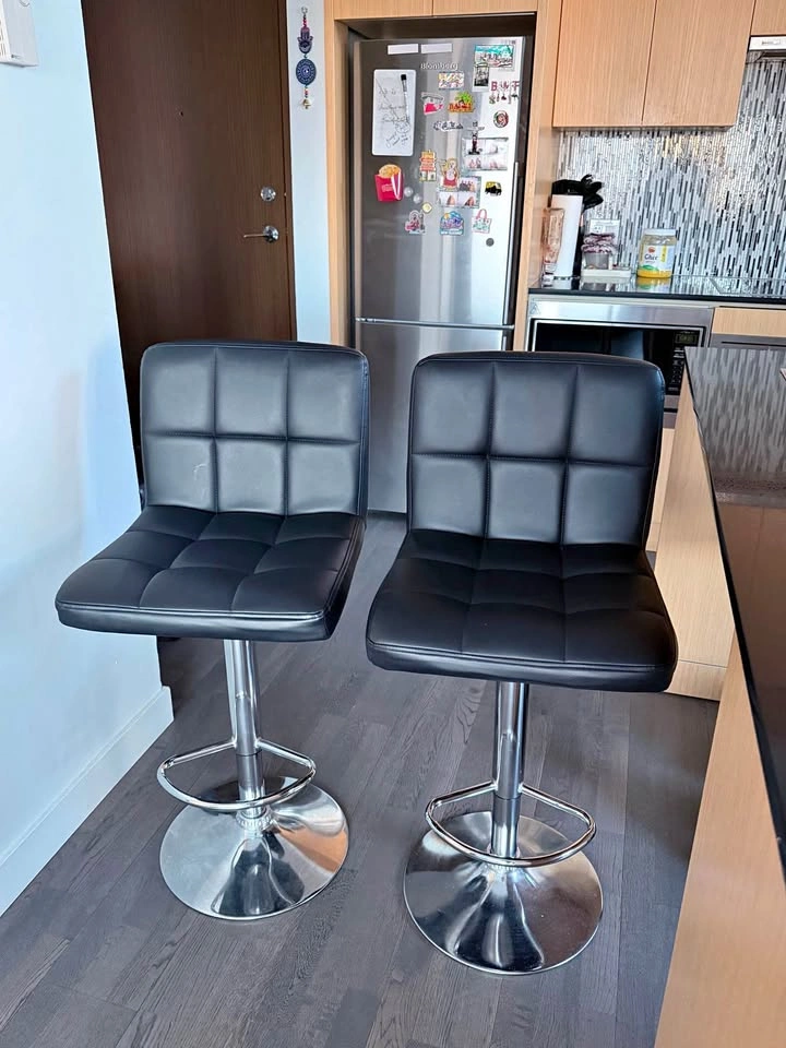 Pair of black Faux Leather swivel Bar Stools