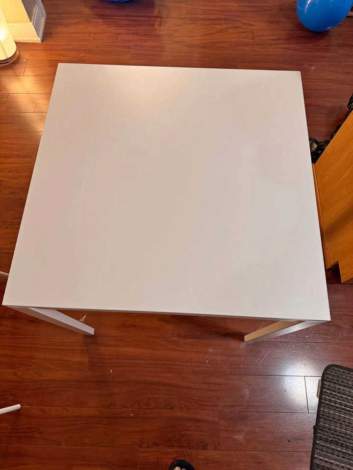 Ikea dining table with four chairs and pads, white