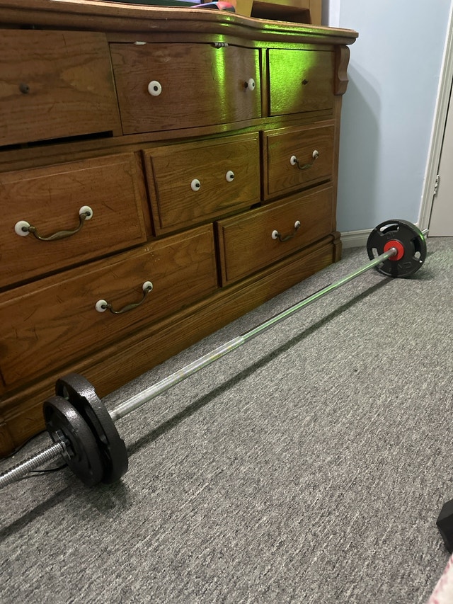 Straight bar with 50 pounds of weight