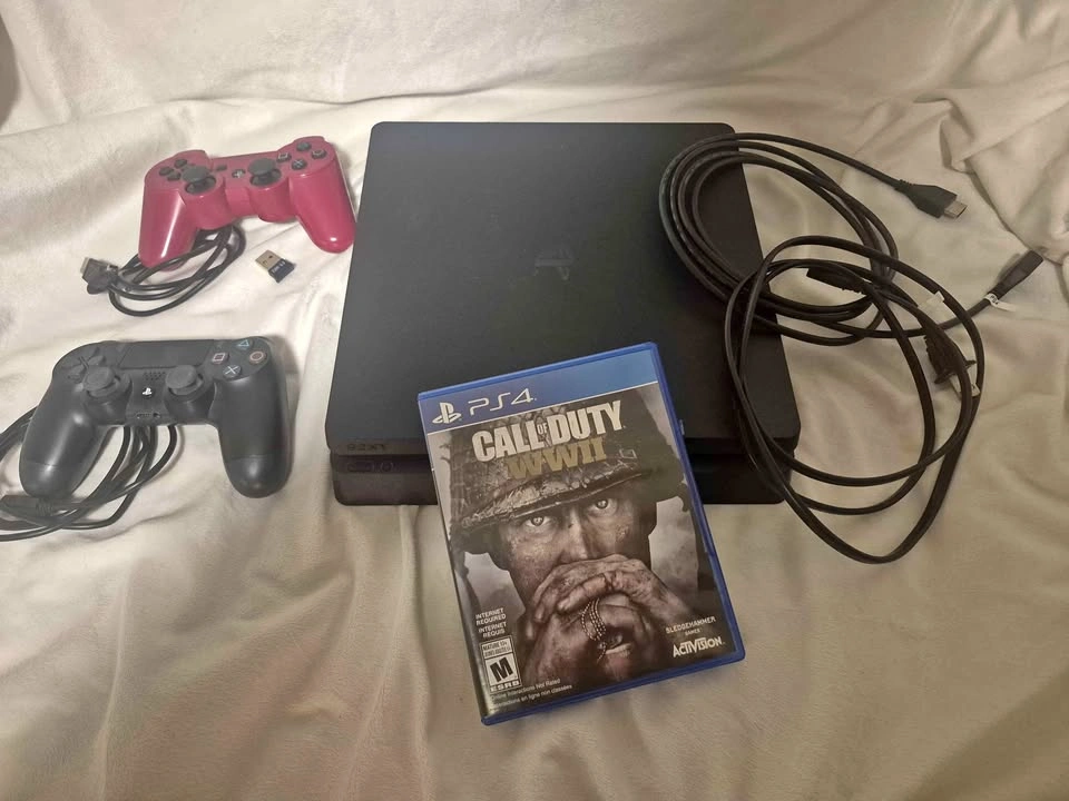 Sony PlayStation 4 (PS4) Slim – 1TB – 2 Controllers + FREE Game