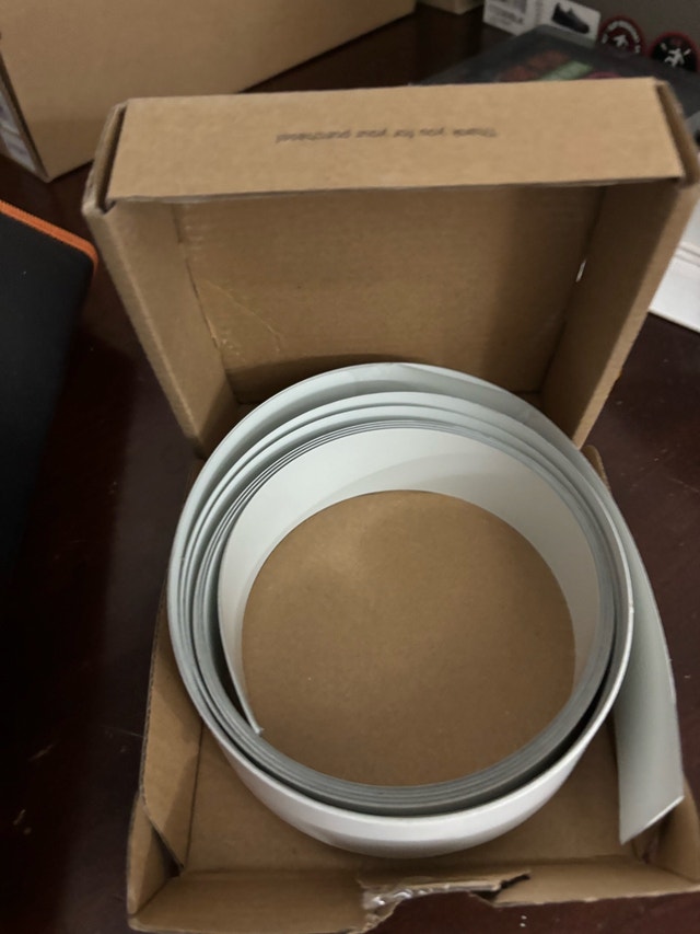 Metallized tape with adhesive backing