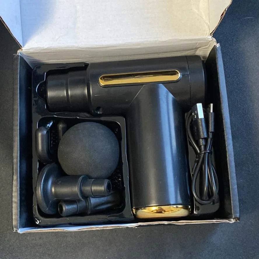 Massage gun with attachments image indicator(2)