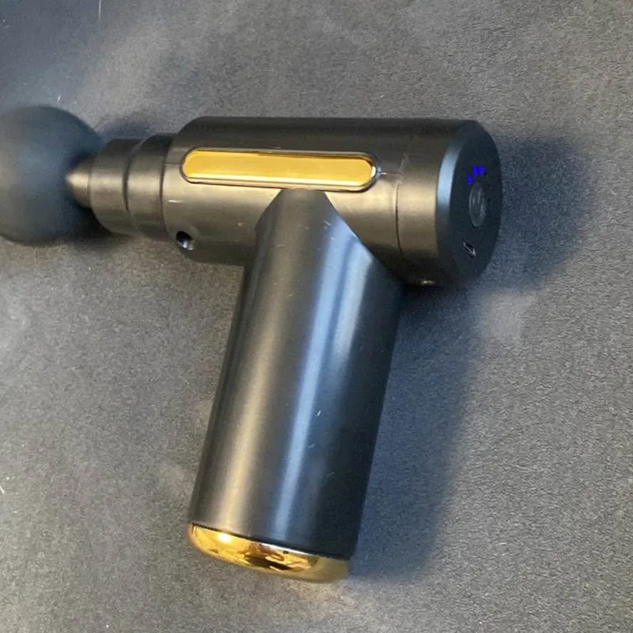 Massage gun with attachments image indicator(4)