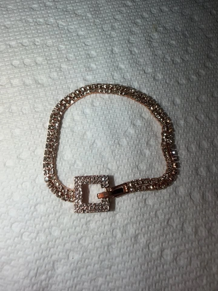 Rose gold tone double row rhinestone tennis bracelet