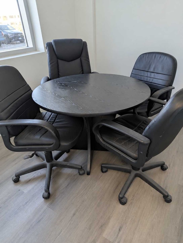 Wood round table and 4 office chairs