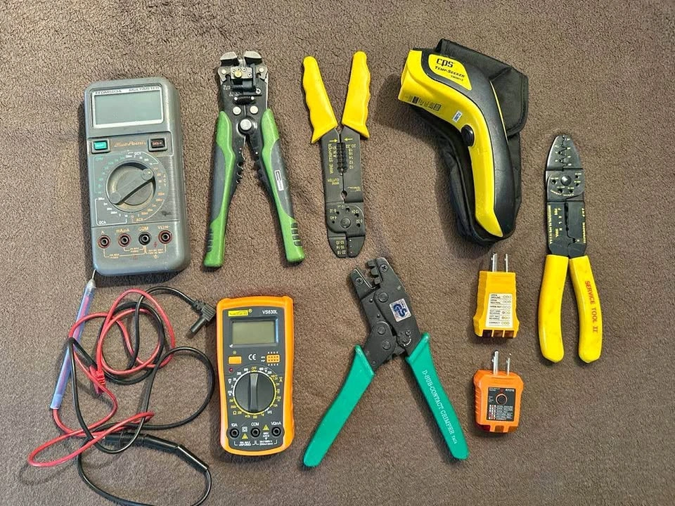 Electrical Tool Lot with Multimeters, Wire Strippers, and Crimpe