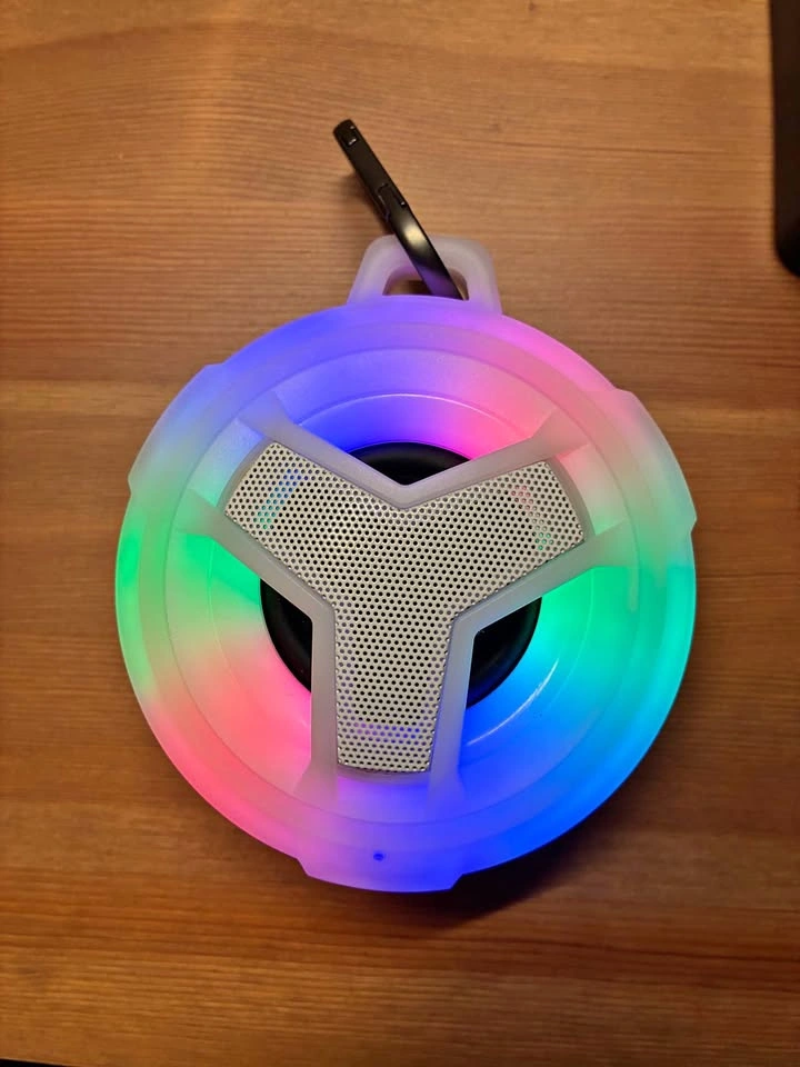 Waterproof portable speaker with LED light