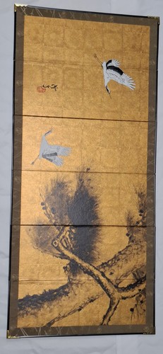 Japanese folding screen depicting cranes and pine trees