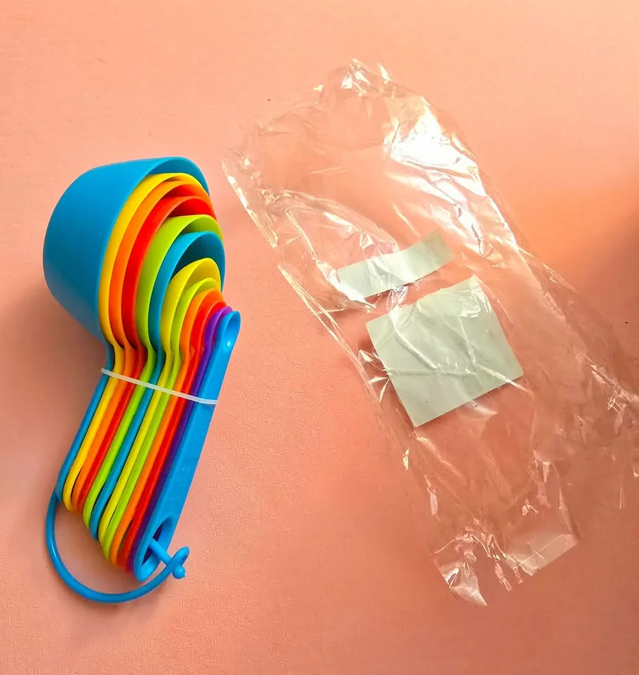 12-Piece Set of Assorted Colors Plastic Measuring Cups image indicator(9)