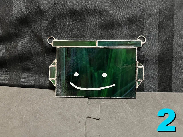 Handmade Stained Glass Three Silly Smiling Dumpsters image indicator(5)