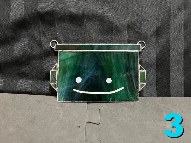 Handmade Stained Glass Three Silly Smiling Dumpsters image indicator(8)