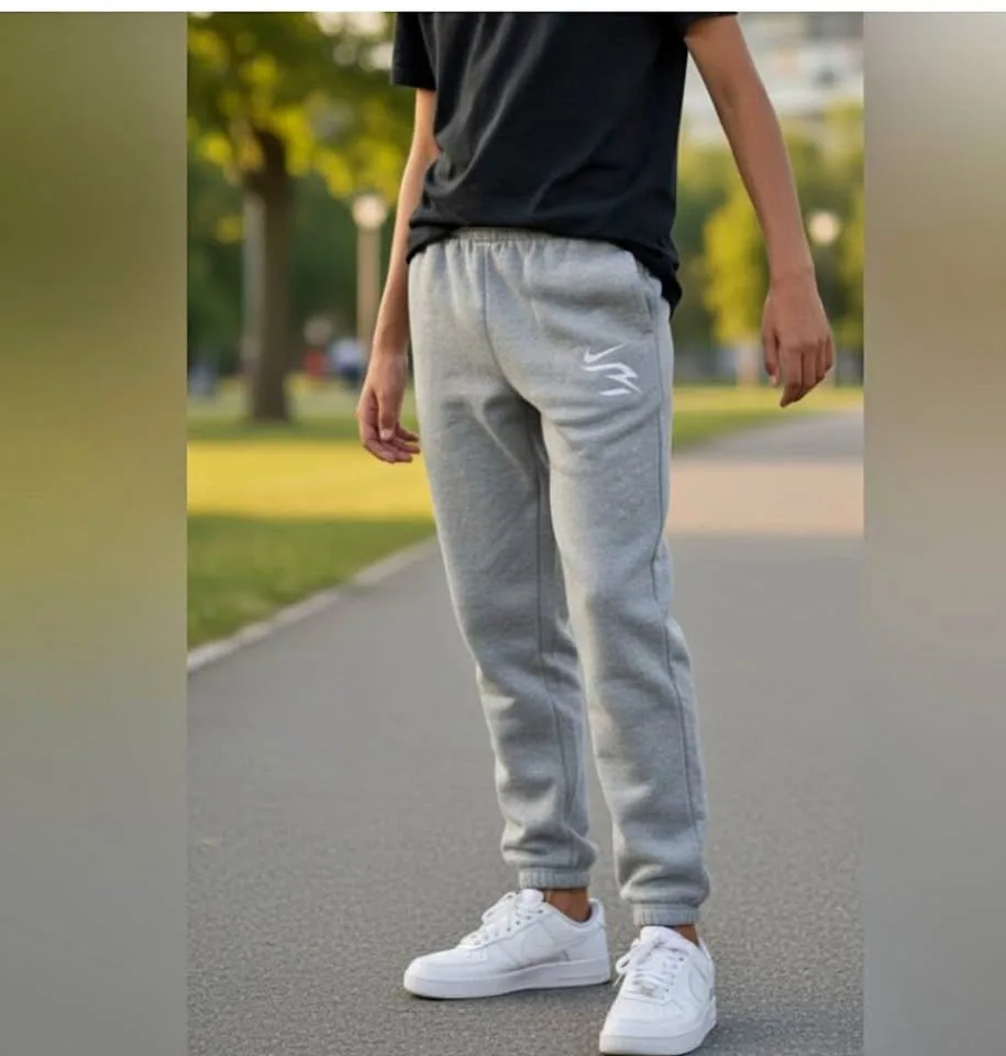 Nike Club Fleece joggers size 12/13 Large Youth unisex grey thumbnail