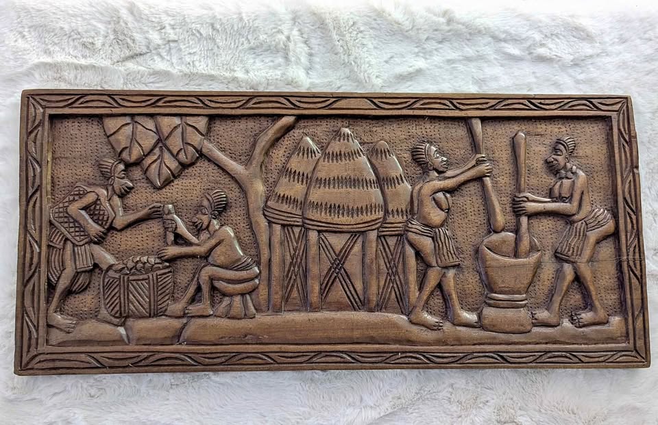 Vintage Hand-Carved African Wall Art 🧡